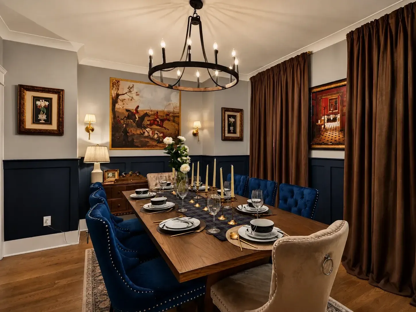 Formal dining room under a wrought-iron chandelier