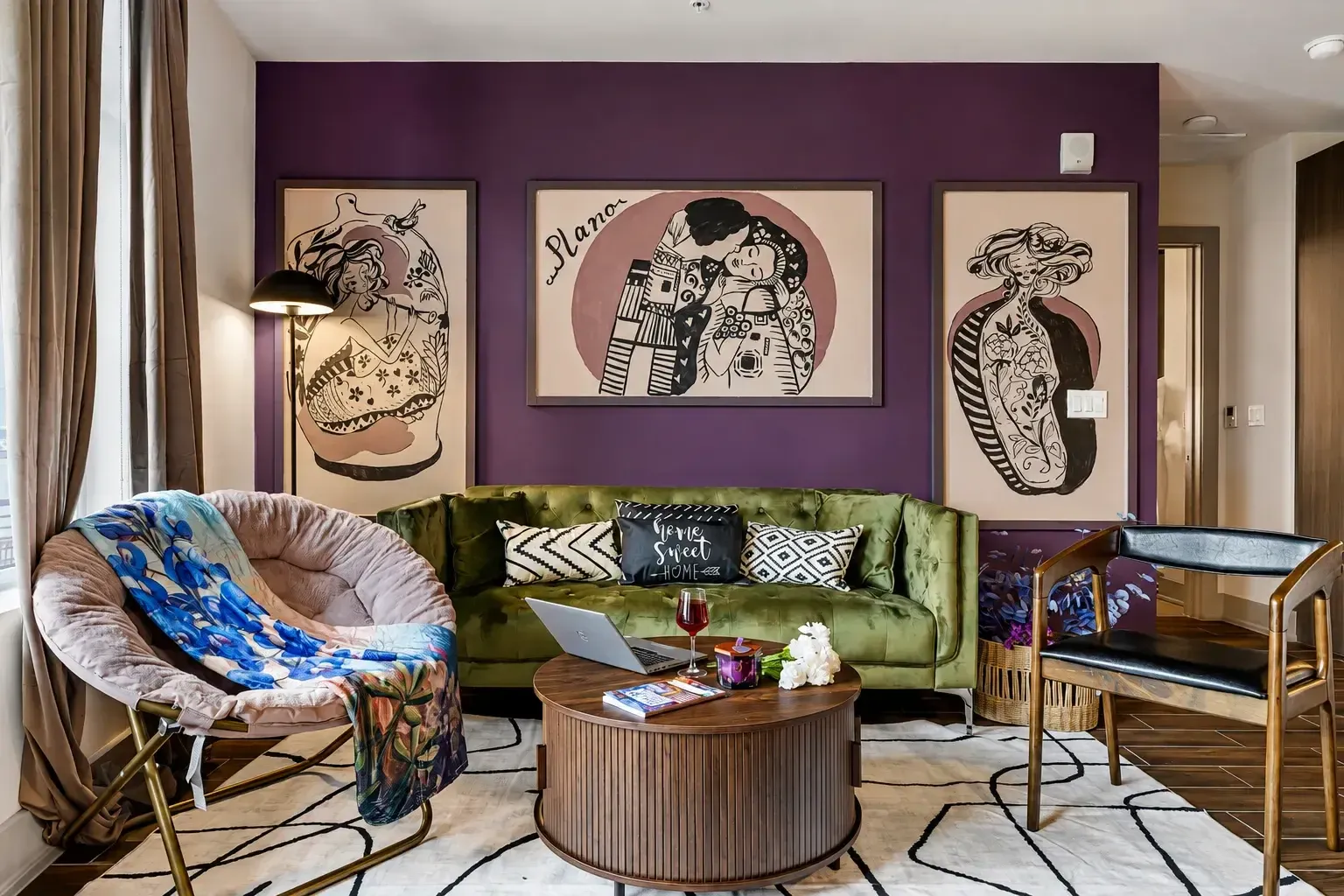 Living room with artwork and lounge chairs